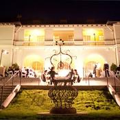 The Historic Villa lit up for an evening event