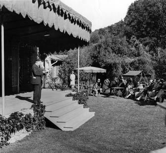 Henry Mead Bland gives a presentation at the Garden Theatre, 1923