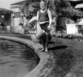 Senator Phelan with a peculiar rubber duck, near the Oval Garden pool