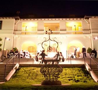 The Historic Villa lit up for an evening event