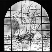 Original stained glass window above the stairs inside the Villa