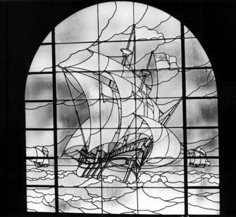Original stained glass window above the stairs inside the Villa