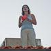 Nancy Popp stands on the roof at Montalvo with her orange mason line.