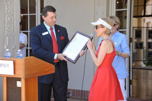 Angela receives an honor from Mayor Chuck Page
