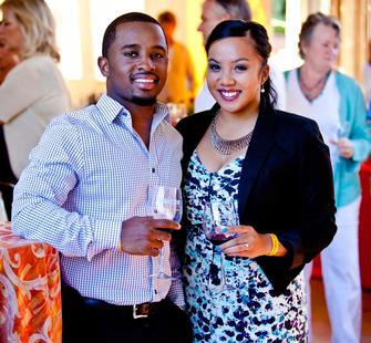 A couple enjoying some reds at Food & Wine